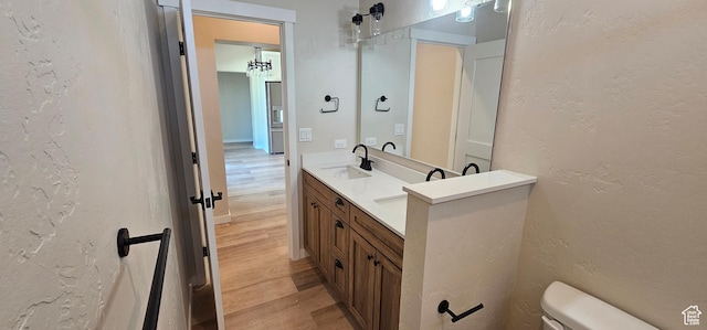 831 N 1820 E Unit 66, Price, UT 84501 - bathroom with vanity, wood-type flooring, and toilet