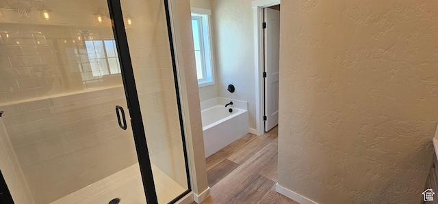831 N 1820 E Unit 66, Price, UT 84501 - bathroom featuring separate shower and tub and wood-type flooring