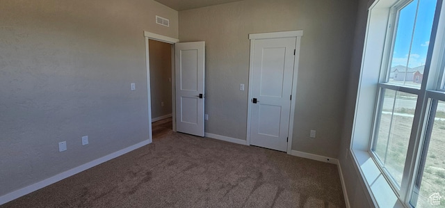 831 N 1820 E Unit 66, Price, UT 84501 - unfurnished bedroom featuring carpet flooring