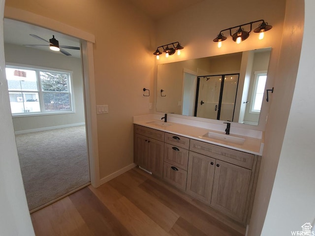 1871 E 840 N Unit 84, Price, UT 84501 - bathroom featuring ceiling fan, wood-type flooring, walk in shower, and vanity