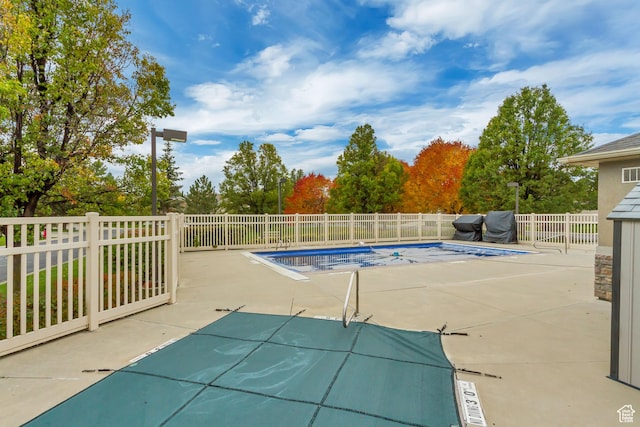 10976 Quartz Dr, South Jordan, UT 84095 - view of pool featuring a fenced in pool, a patio, and fence