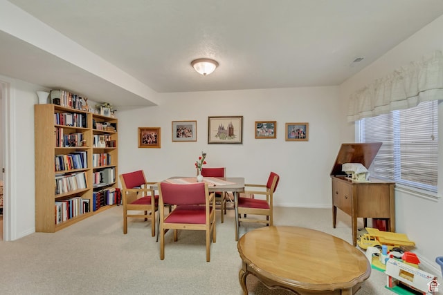 10976 Quartz Dr, South Jordan, UT 84095 - dining area with carpet flooring and baseboards