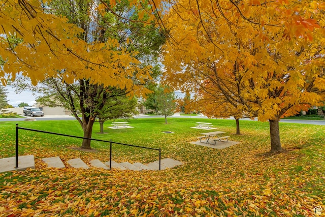 10976 Quartz Dr, South Jordan, UT 84095 - view of home's community featuring a yard and fence