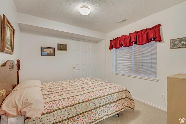 10976 Quartz Dr, South Jordan, UT 84095 - bedroom with carpet flooring, visible vents, a textured ceiling, and baseboards