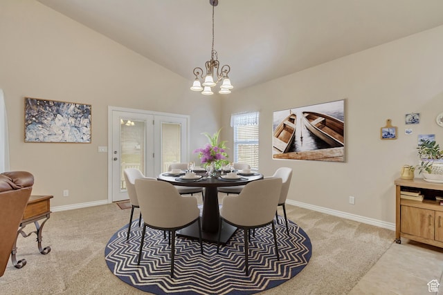 10976 Quartz Dr, South Jordan, UT 84095 - dining area with high vaulted ceiling, light colored carpet, a notable chandelier, and baseboards
