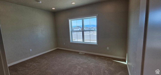854 N 1880 E Unit 72, Price, UT 84501 - unfurnished room featuring a mountain view and dark carpet