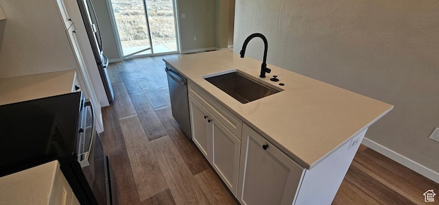 854 N 1880 E Unit 72, Price, UT 84501 - kitchen with stainless steel dishwasher, sink, a center island with sink, hardwood / wood-style floors, and white cabinetry