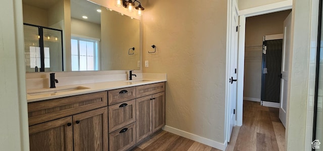 854 N 1880 E Unit 72, Price, UT 84501 - bathroom with vanity, wood-type flooring, and an enclosed shower