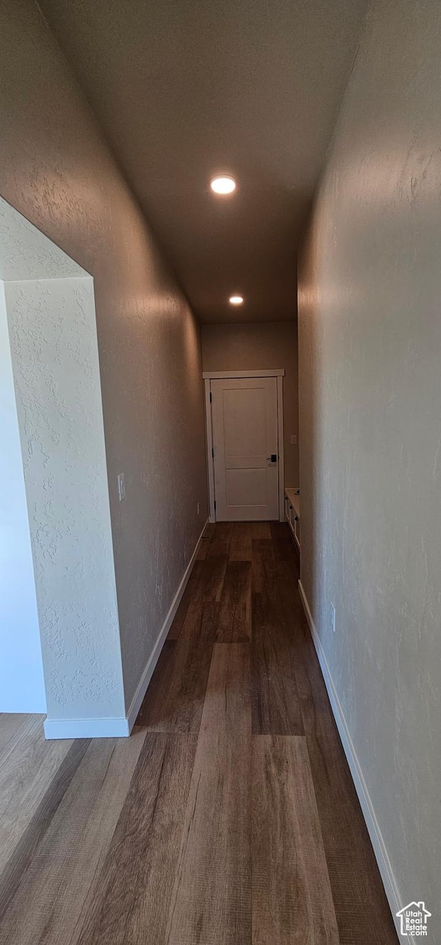 1840 E 840 N Unit 81, Price, UT 84501 - hallway featuring dark hardwood / wood-style floors