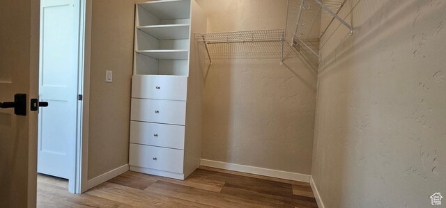 1840 E 840 N Unit 81, Price, UT 84501 - walk in closet featuring hardwood / wood-style floors