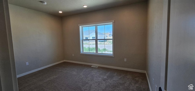 1840 E 840 N Unit 81, Price, UT 84501 - empty room featuring a mountain view and dark carpet