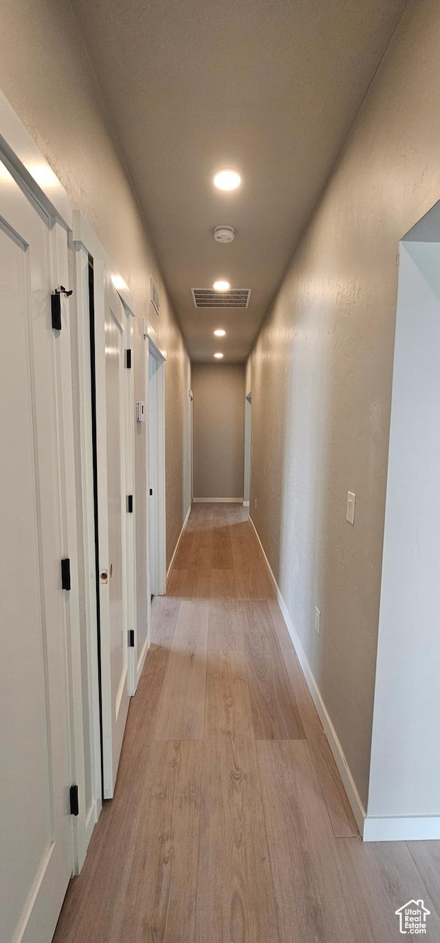 1843 E 840 N Unit 86, Price, UT 84501 - hall featuring light hardwood / wood-style floors