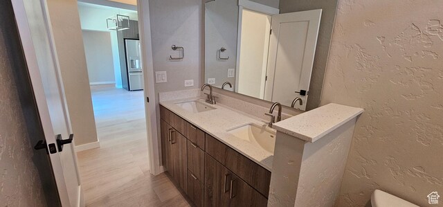 1843 E 840 N Unit 86, Price, UT 84501 - bathroom with vanity and wood-type flooring