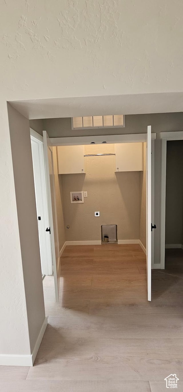 1843 E 840 N Unit 86, Price, UT 84501 - laundry room featuring washer hookup and light hardwood / wood-style floors