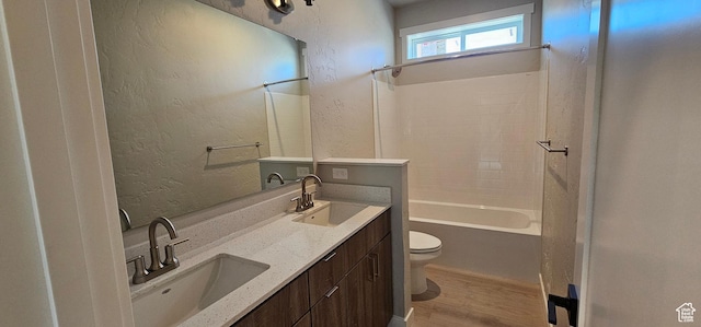 1843 E 840 N Unit 86, Price, UT 84501 - full bathroom featuring vanity,  shower combination, hardwood / wood-style flooring, and toilet