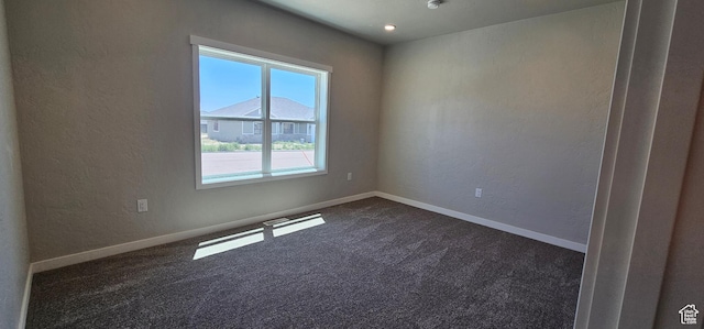 1843 E 840 N Unit 86, Price, UT 84501 - carpeted empty room with a healthy amount of sunlight