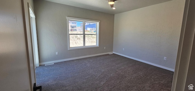 1843 E 840 N Unit 86, Price, UT 84501 - empty room featuring dark colored carpet