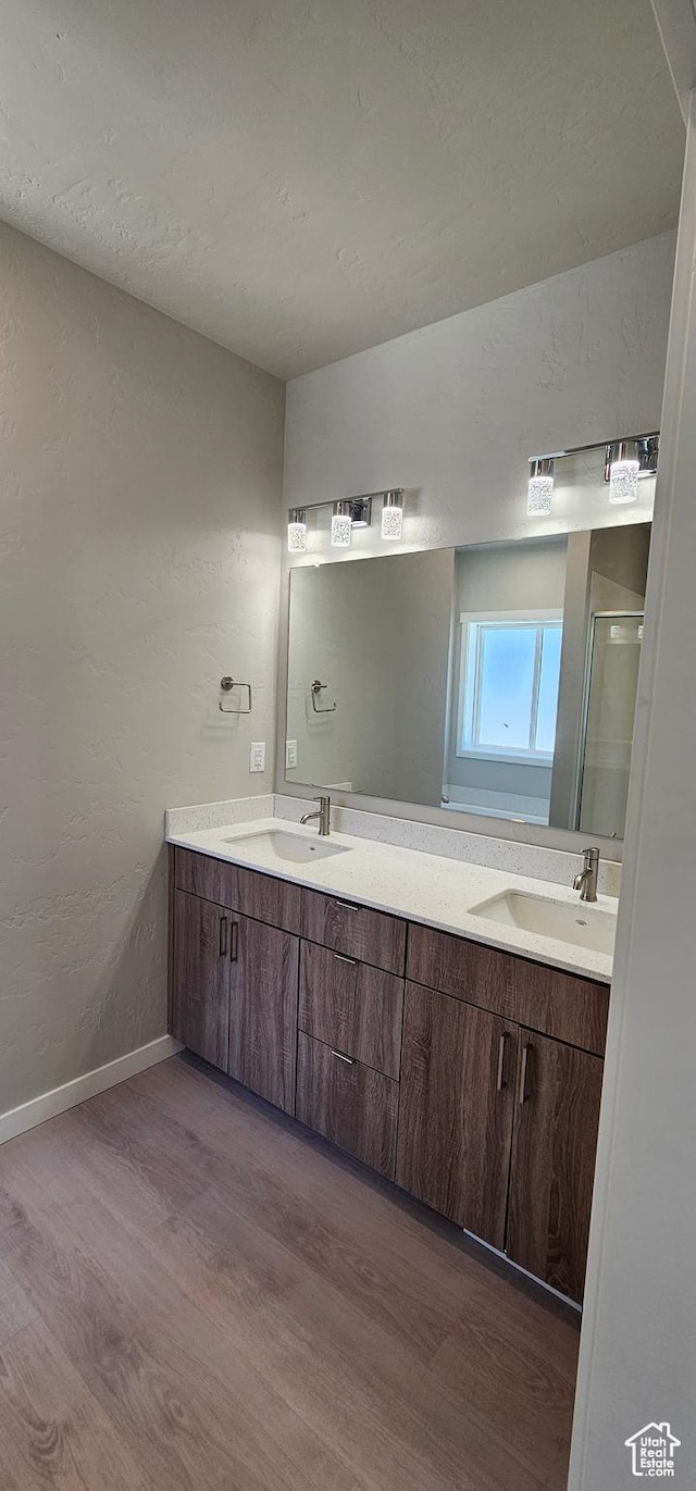 1843 E 840 N Unit 86, Price, UT 84501 - bathroom featuring vanity and wood-type flooring