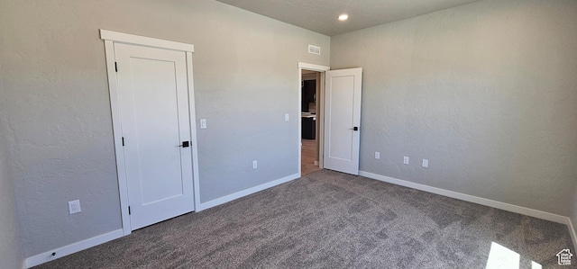 1843 E 840 N Unit 86, Price, UT 84501 - unfurnished bedroom with dark colored carpet