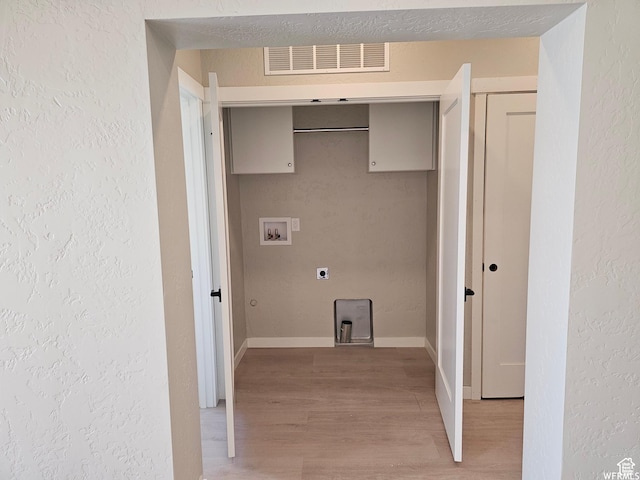 1858 E 840 N Unit 82, Price, UT 84501 - washroom featuring hookup for an electric dryer, hookup for a washing machine, and light hardwood / wood-style flooring