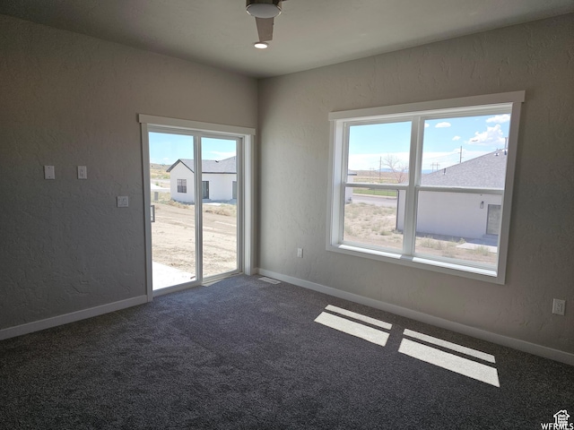 1858 E 840 N Unit 82, Price, UT 84501 - carpeted empty room with ceiling fan