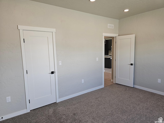 1858 E 840 N Unit 82, Price, UT 84501 - unfurnished bedroom featuring carpet