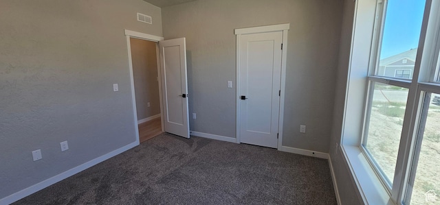 1829 E 840 N Unit 87, Price, UT 84501 - unfurnished bedroom featuring dark carpet