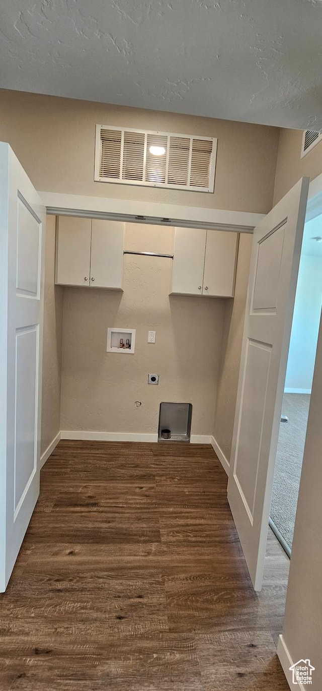 1829 E 840 N Unit 87, Price, UT 84501 - washroom with hookup for an electric dryer, hookup for a washing machine, dark hardwood / wood-style floors, and cabinets