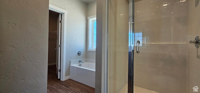 1829 E 840 N Unit 87, Price, UT 84501 - bathroom featuring hardwood / wood-style floors and independent shower and bath