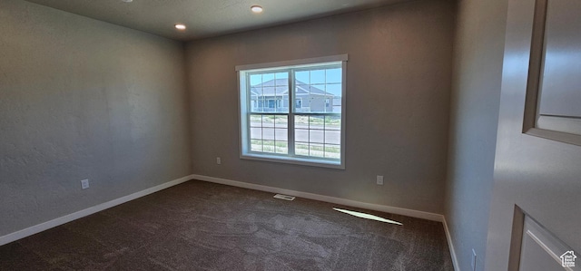 empty room with carpet floors