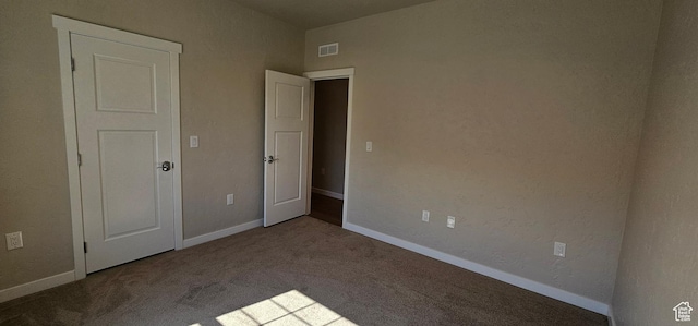 unfurnished bedroom featuring carpet flooring