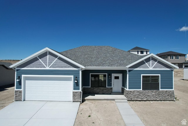 craftsman inspired home with a garage