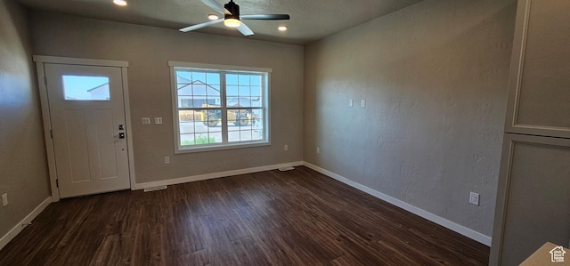 foyer featuring dark hardwood / wood-style flooring and ceiling fan