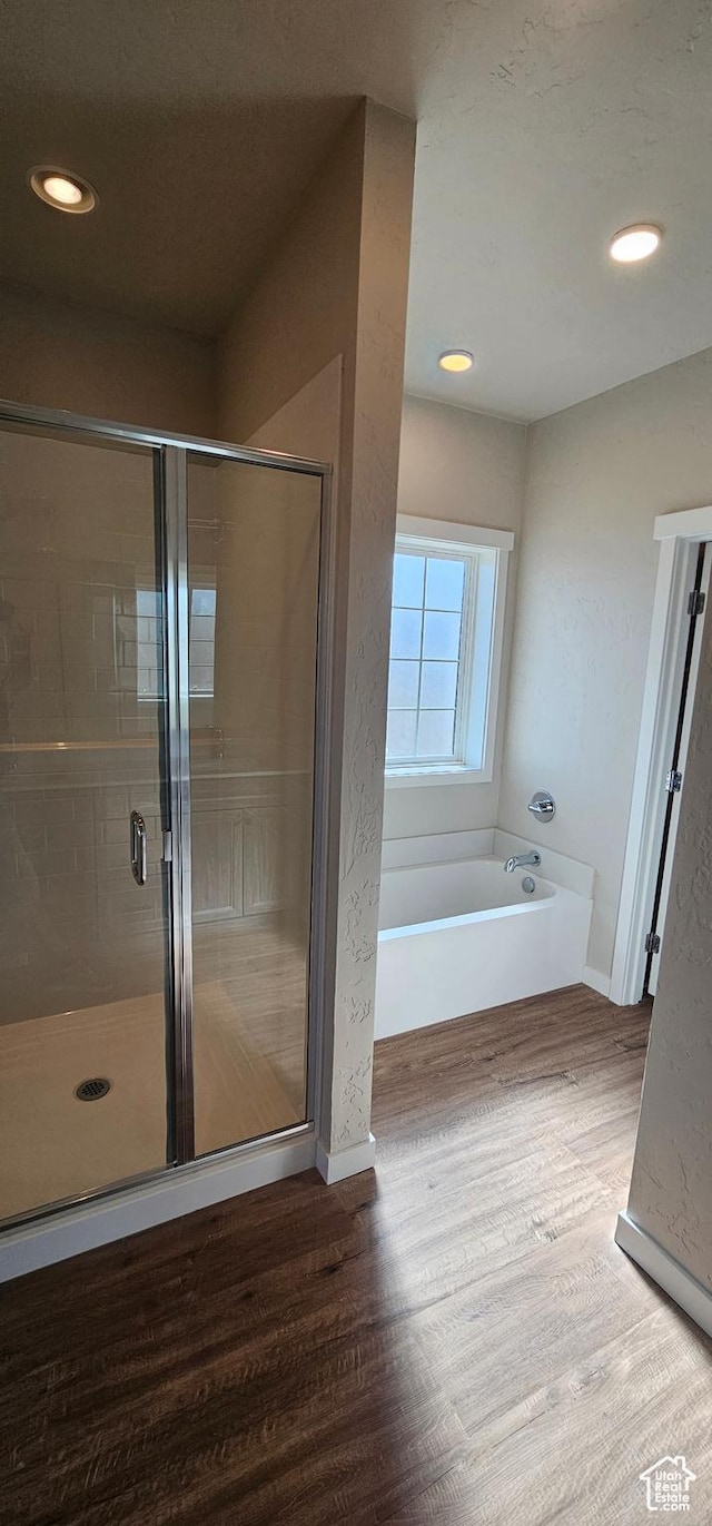 868 N 1880 E Unit 71, Price, UT 84501 - bathroom featuring hardwood / wood-style floors and separate shower and tub