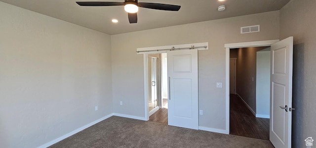 868 N 1880 E Unit 71, Price, UT 84501 - unfurnished bedroom with dark colored carpet and ceiling fan