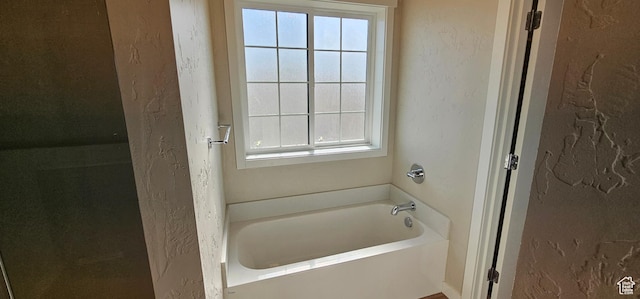 868 N 1880 E Unit 71, Price, UT 84501 - bathroom featuring a bathtub and plenty of natural light