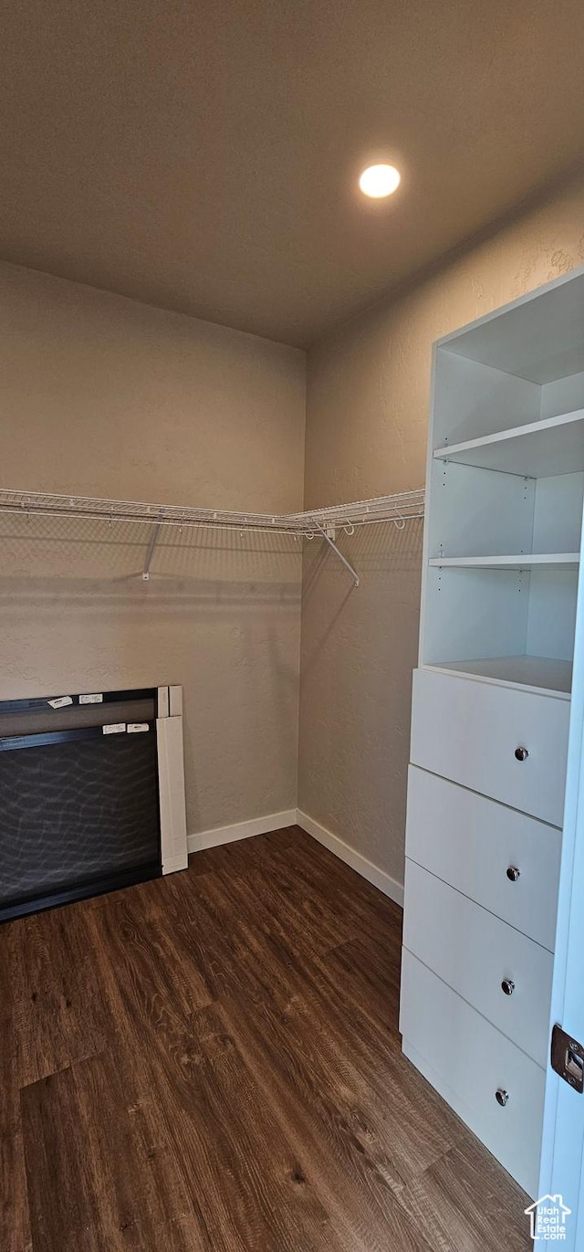 1830 E 840 N Unit 80, Price, UT 84501 - spacious closet featuring dark wood-type flooring