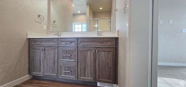 1830 E 840 N Unit 80, Price, UT 84501 - bathroom featuring hardwood / wood-style floors, vanity, and walk in shower