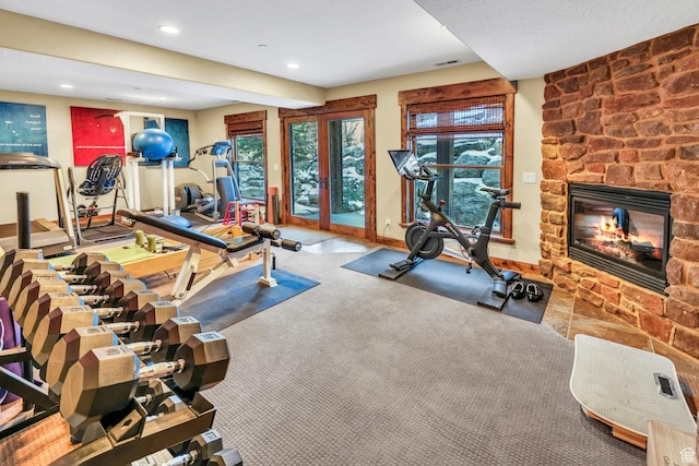 9049 N Timphaven Rd, Sundance, UT 84604 - workout room with a fireplace
