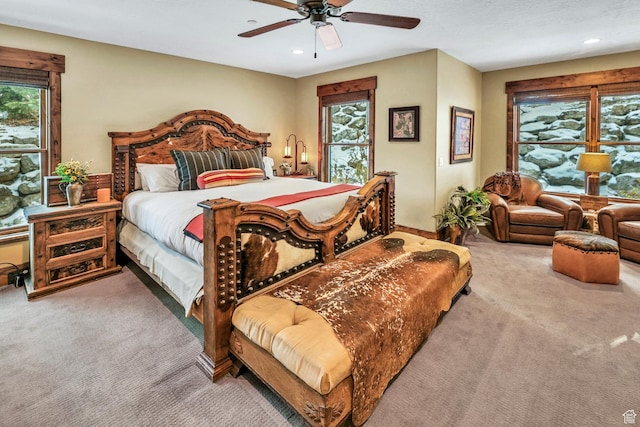 9049 N Timphaven Rd, Sundance, UT 84604 - bedroom with carpet flooring, multiple windows, and ceiling fan