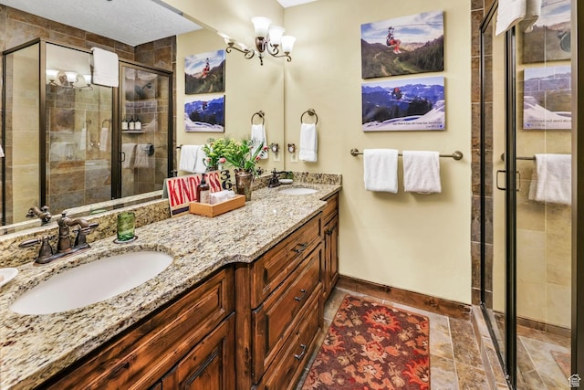 9049 N Timphaven Rd, Sundance, UT 84604 - bathroom with a chandelier, vanity, and an enclosed shower