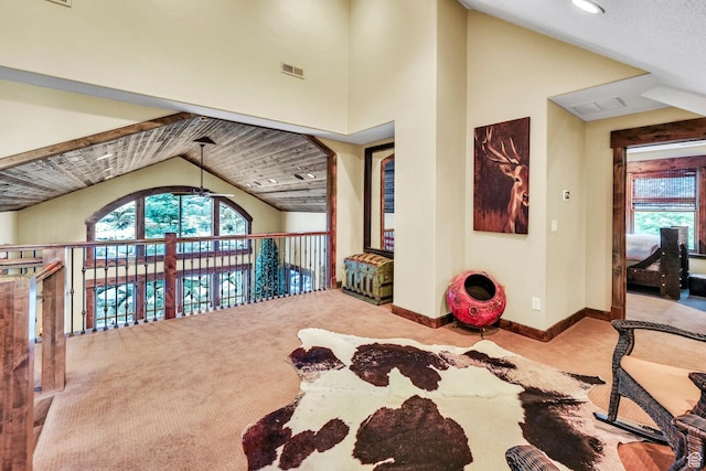 9049 N Timphaven Rd, Sundance, UT 84604 - interior space featuring ceiling fan, light carpet, and vaulted ceiling