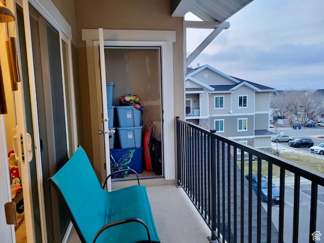 balcony featuring a residential view