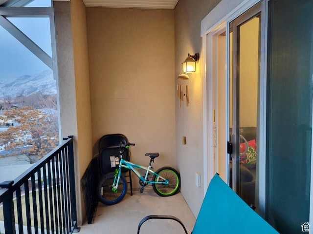 balcony featuring a mountain view