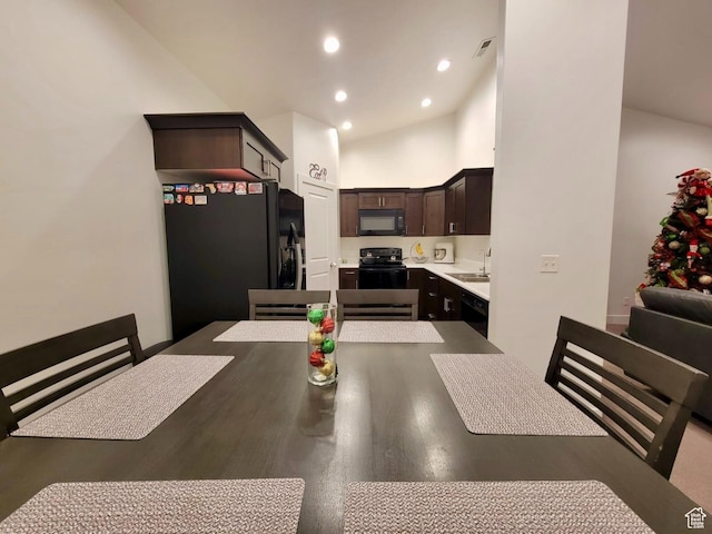 dining space featuring recessed lighting, visible vents, and high vaulted ceiling