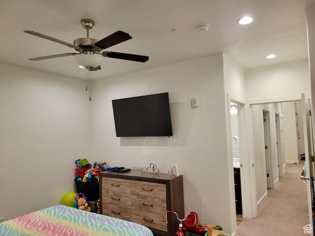bedroom featuring a ceiling fan, recessed lighting, baseboards, and light carpet