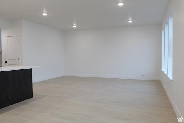 715 E 1250 S, Hyrum, UT 84319 - unfurnished living room with light wood-type flooring, recessed lighting, and baseboards
