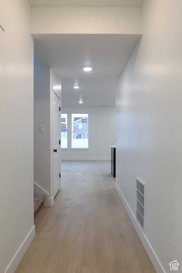 715 E 1250 S, Hyrum, UT 84319 - hall featuring baseboards, light wood-style flooring, and stairs