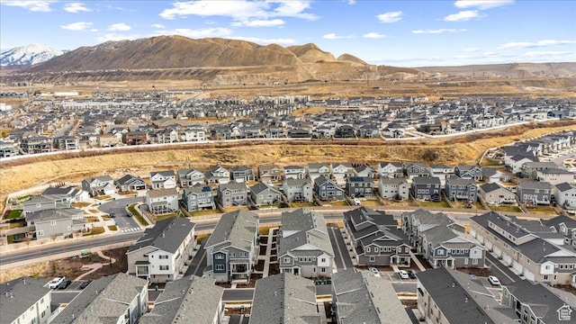 15091 S Reins Way W, Bluffdale, UT 84065 - aerial overview of property's location with nearby suburban area and a mountain backdrop