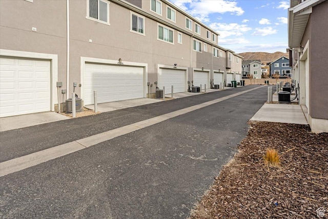15091 S Reins Way W, Bluffdale, UT 84065 - view of asphalt road featuring a residential view